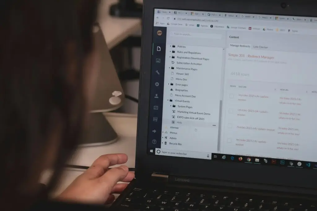 Founder writing at a desk in a small studio — brand voice for small organizations